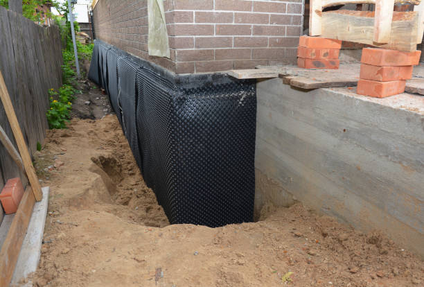 Happy homeowners after waterproofing job in Tippecanoe